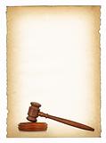 wooden gavel against old dirty paper background