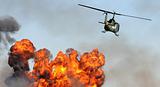 Helicopter over explosion
