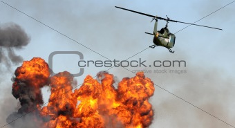 Helicopter over explosion