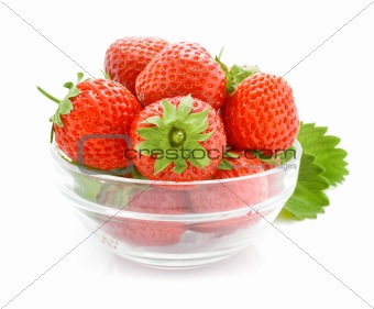 red strawberry fruits in the glass vase