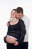 expecting couple - man touching his pregnant wife«s belly