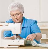 Older Woman Sewing