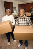 Senior Couple With Moving Boxes