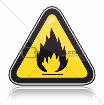 Yellow triangular warning sign. Attention flammable