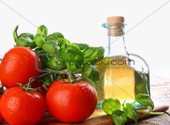 Tomatoes with fresh basil and olive oil