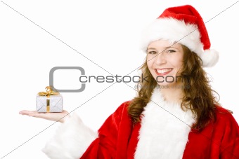 Young happy woman with Santa Claus costume is holding Christmas 