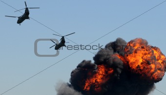 Helicopters over fire