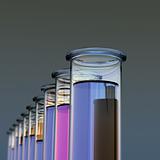 Ten test tubes with two colored liquids