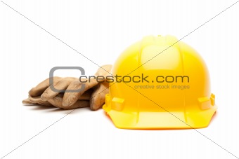 Yellow Hard Hat and Gloves Isolated on White.