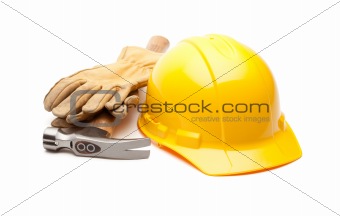 Yellow Hard Hat, Gloves and Hammer Isolated on White.