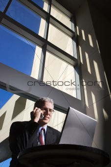 Businessman with Laptop Computer.