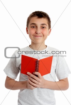 Student holding book in both hands