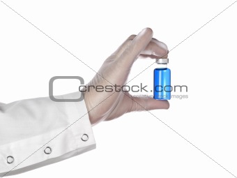 Blue vial on a hand