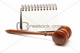 Blank Spiral Note Pad and Gavel Isolated on White.