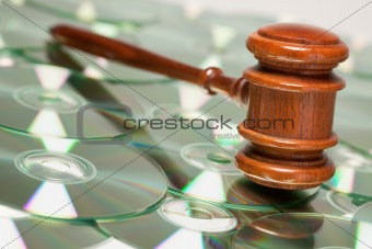 CD Rom or DVD Discs Spread Out and Gavel.