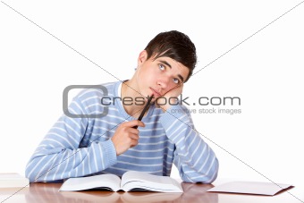 Young handsome male student with study books looking contemplati
