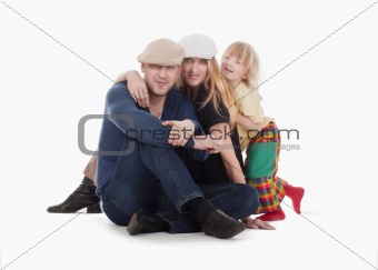 family - father, mother and boy with long hair isolated on white
