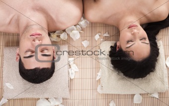 Beautiful relaxing couple in a spa closeup shot