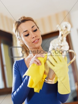 woman polishing silverware