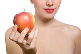beautiful young blonde woman offering red apple