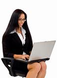 businesswoman in chair with laptop computer 