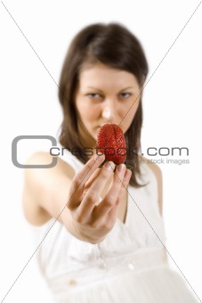 sexy young woman holding fresh strawberry