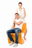 picture of a man and woman on chair