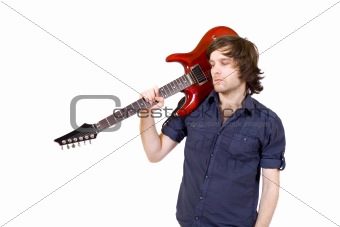 guitarist with his guitar on shoulder