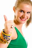 Casual woman smiling with her thumbs up