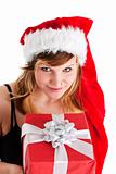 young woman holding a christmas gift isolated on white