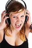 young woman screams for joy while listening to music