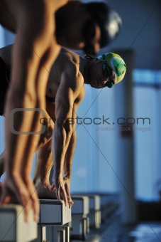 young swimmmer on swimming start