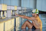 young swimmmer on swimming start