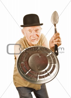 Senior defending himself with spoon and can lid