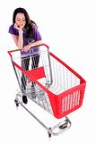 Unhappy girl with shopping cart 