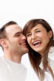 happy, young couple laughing together 