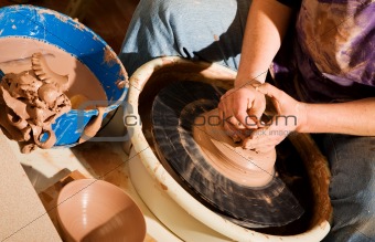 Potter Shaping Clay