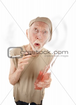 Senior man with gigarette and liquor bottle