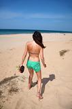 green shorts woman to beach