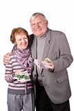 Elderly married couple with money in hands