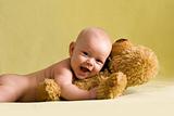 Happy baby with Teddy bear