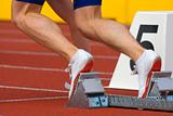 sport - runner at starting block in running competition