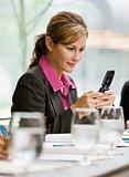 Businesswoman Texting with Cell Phone
