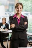 Businesswoman Standing and Smiling
