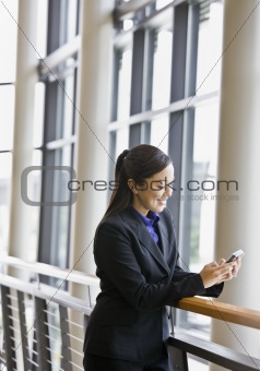 Young Businesswoman Texting