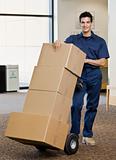 Young Man Moving Boxes