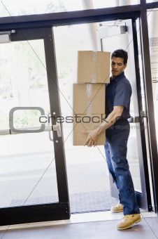 Young Man Delivering Boxes