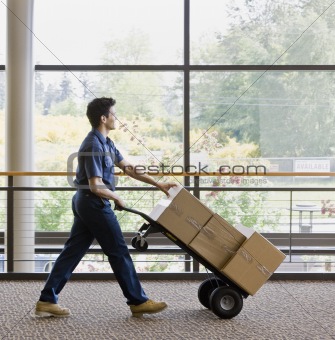 Young Man Moving Boxes