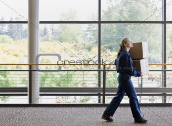 Young Woman Delivering Boxes