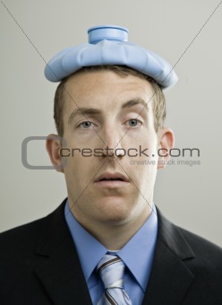 Businessman with Ice Pack